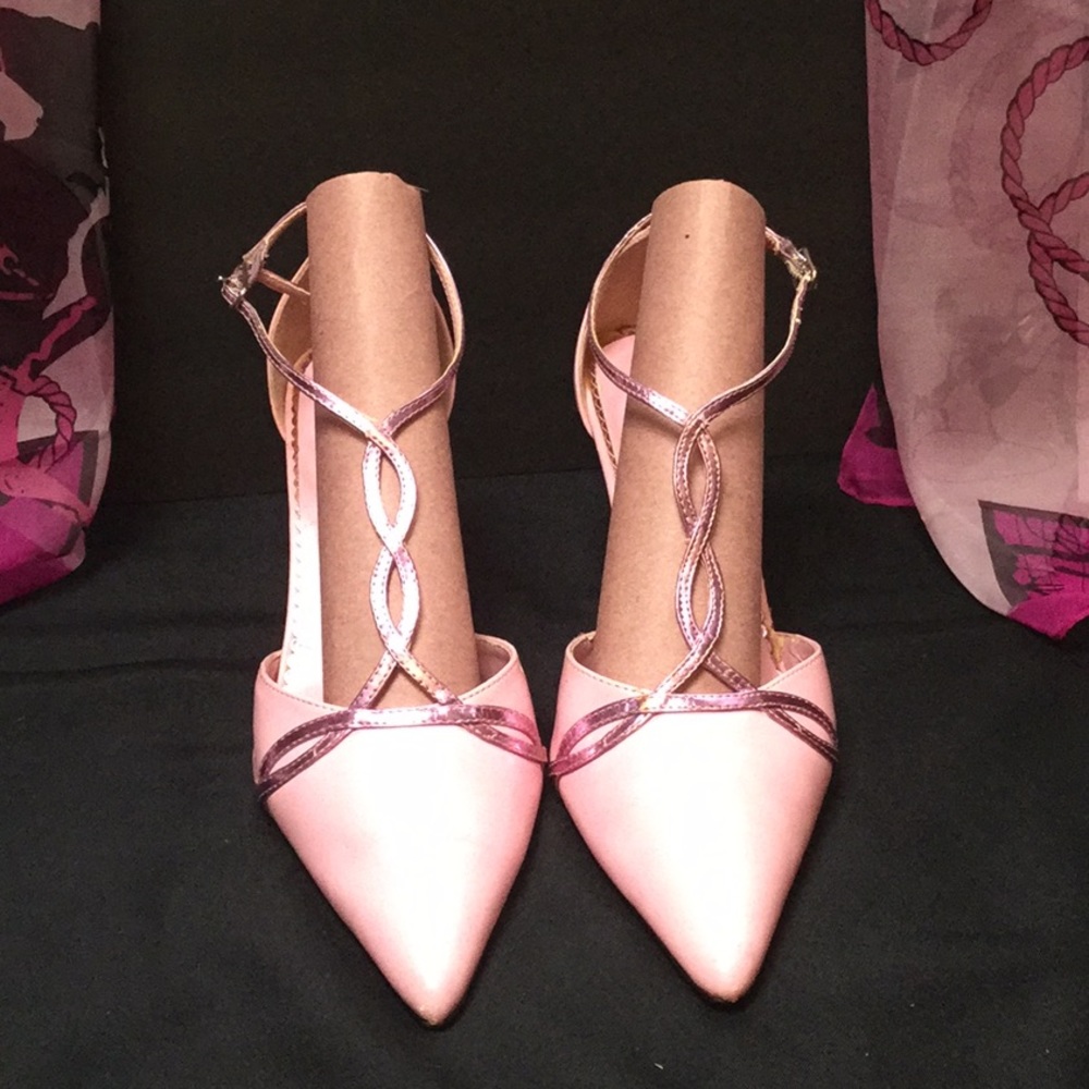 Studio 8 Swirl t-strapped heels.